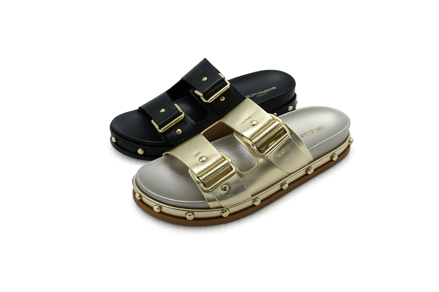 Black and metallic buckle slides with studded outsoles